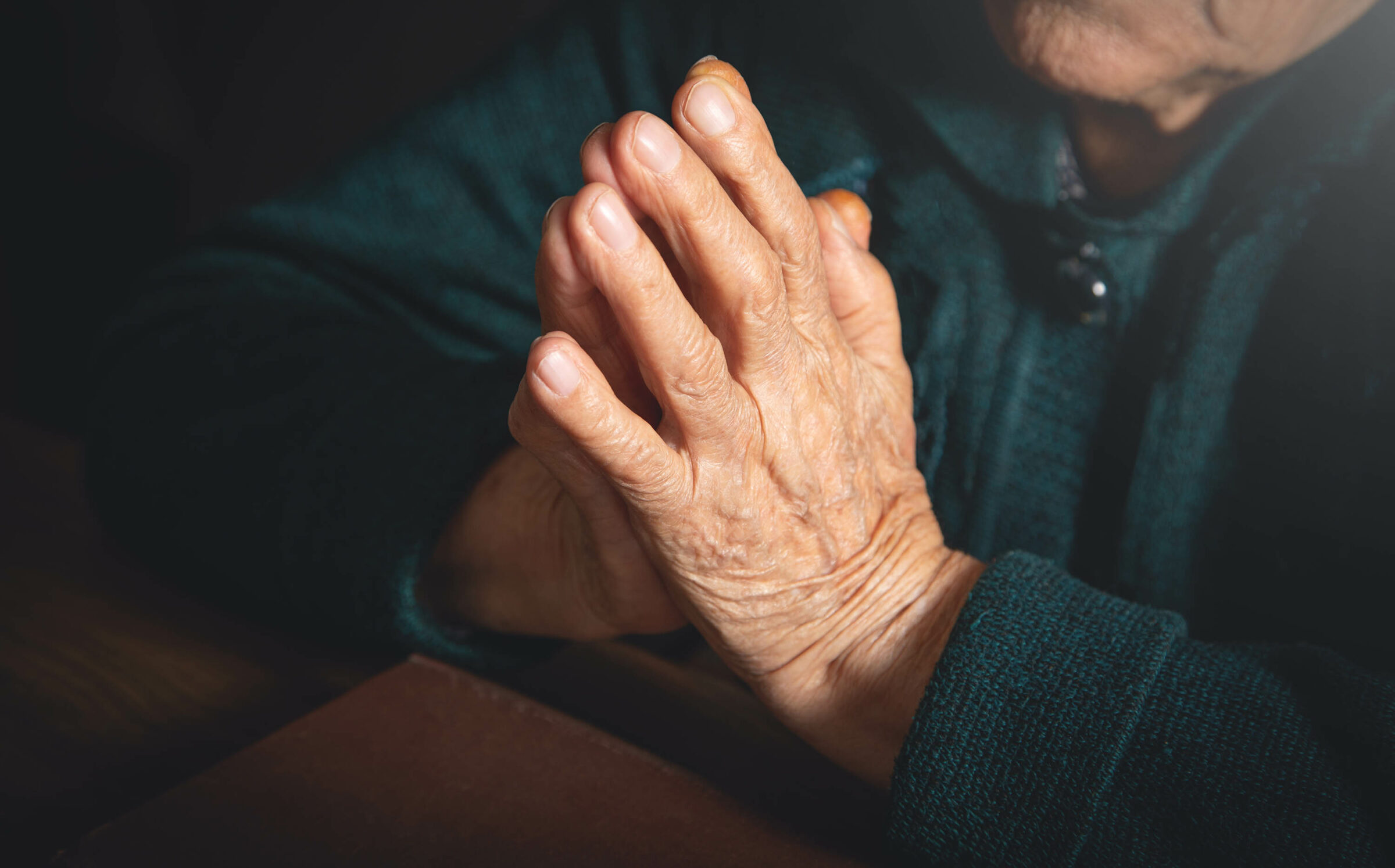 Caucasian Elderly Woman Praying. Faith. Religion