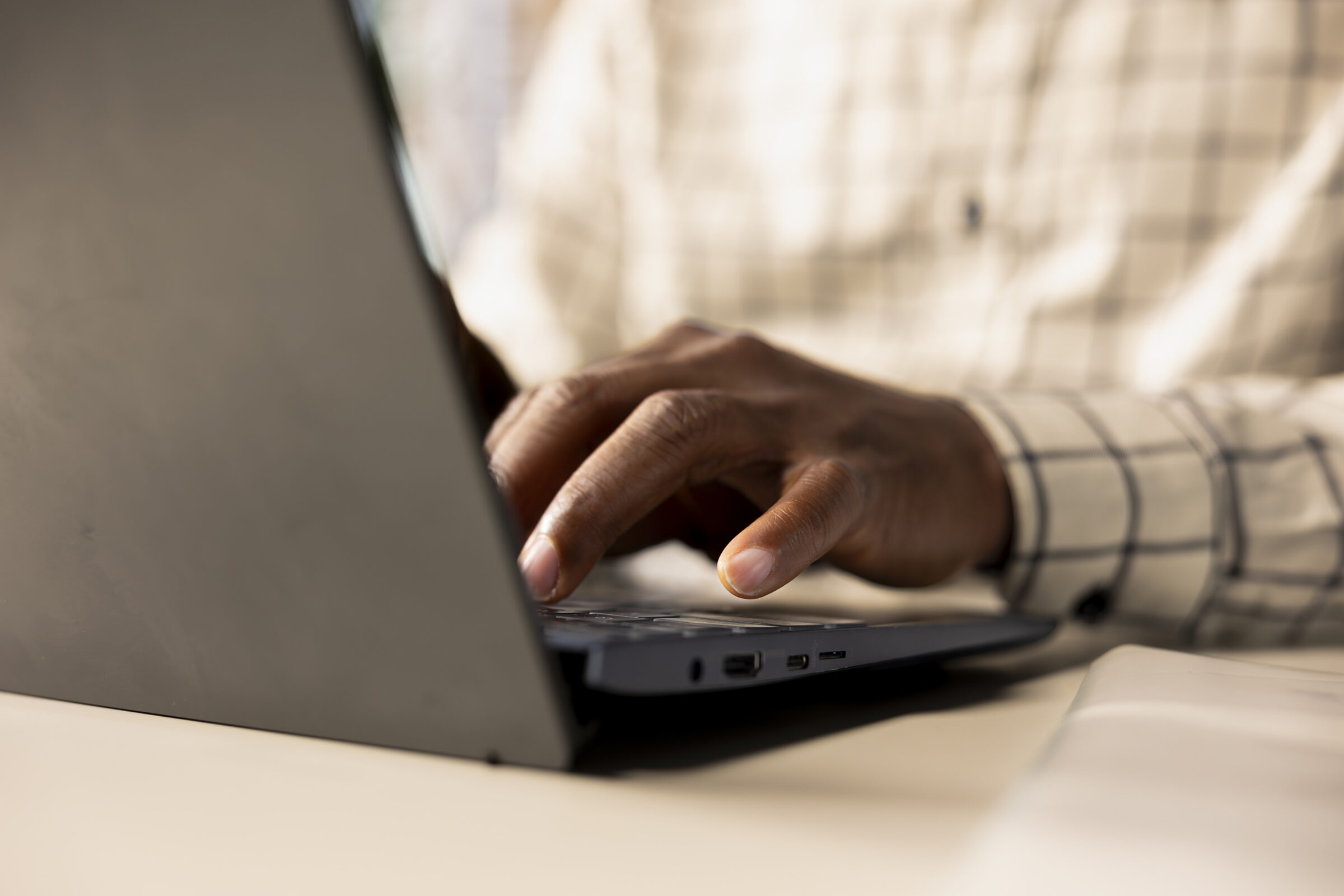 African American General Manager Reviews Business Forecasts And Plans